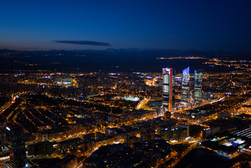 Panoramic aerial view of Madrid at night, Metropolis Building lights, capital of Spain, Europe