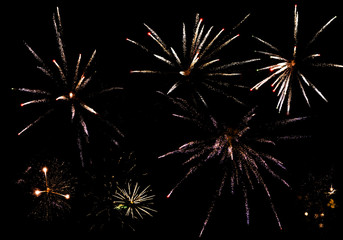 Fireworks in the night sky. Background Festive light show.