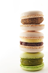 Pile of macaroons on white background 