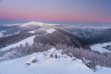 Fototapeta na wymiar Beautiful pink morning in winter mountains