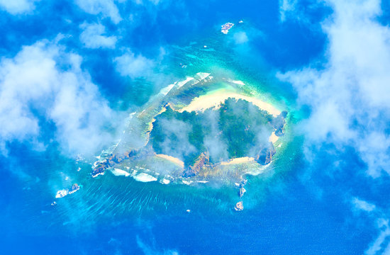 Tropical Island "Dumunpalit" from Drone View perspective. Idyllic place in the north of Palawan, Philippines.