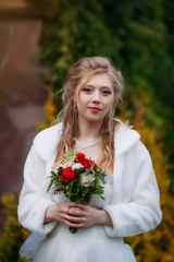 Young beautiful bride in a wedding dress