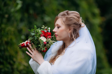 Young beautiful bride in a wedding dress