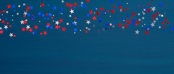 Confetti stars in American flag colors on blue background. Happy Presidents Day Banner mockup. USA...