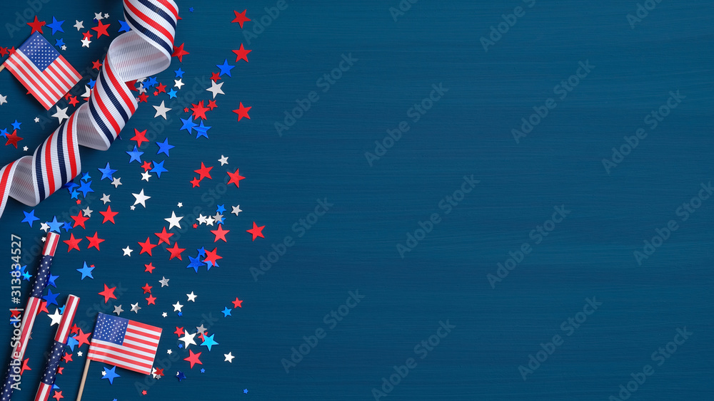 Wall mural happy presidents day concept. grosgrain ribbon, american flags and confetti stars on blue background