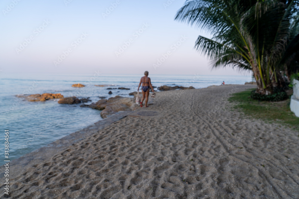 Canvas Prints young couple on the beach