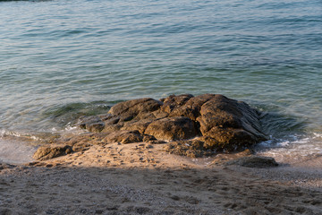 waves crashing on rocks
