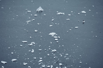 pieces of ice at a frozen city rate in winter