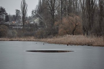 pieces of ice at a frozen city rate in winter