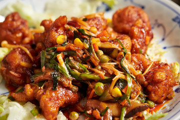 Fried chicken and vegetable with spicy sauce 