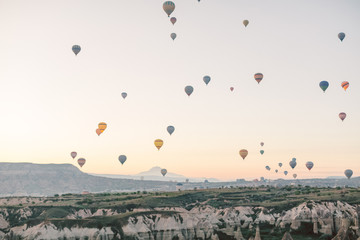 Hot Air Balloons Flying at Sunset, Cappadocia, Turkey