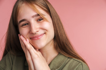 Photo of happy caucasian woman smiling and looking at camera