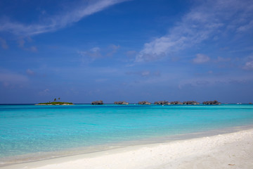 Fototapeta na wymiar Gili Lankanfushi Maldives resort seen from the beach of Paradise Island (Lankanfinolhu), Maldives