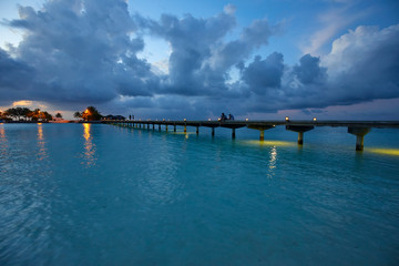 Footbridge of Paradise Island (Lankanfinolhu) at dusk, Maldives