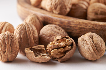 Heap of walnuts on white background