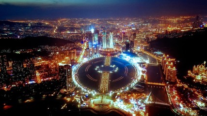 Aerial photo of night view of Xinghai Square, Dalian, China - obrazy, fototapety, plakaty