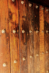 Heavy wooden entrance door from recycled railway sleepers