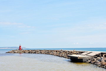 Red lighthouse on the Gola del Segura on the Segura river of Guardamar del Segura, Alicante. Spain. Europe. September 23, 2019