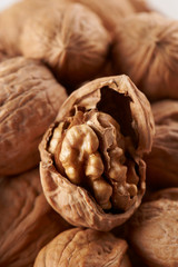 Pile of walnuts on white background