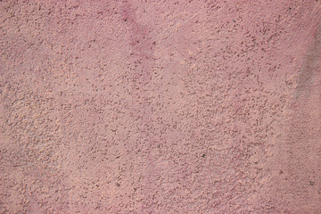 Pink plastered wall