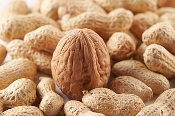 Heap of walnuts and peanuts background