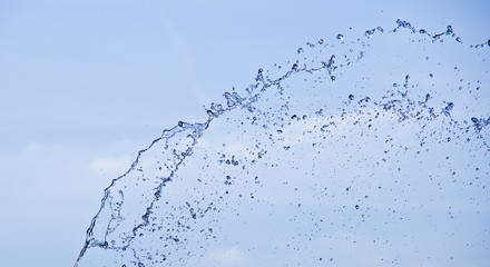 water splash on clear blue background
