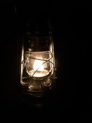 Fototapeta na wymiar old lamp on black background
