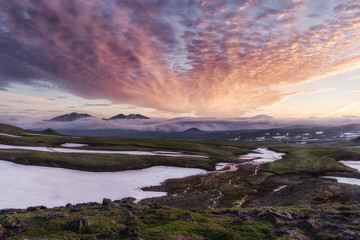 Beautiful volcano landscape of Kamchatka Peninsula: sunrise over Vilyuchinsky Volcano (Vilyuchik Volcano) - popular travel destinations for tourists and travelers visiting Kamchatka Region in Russia