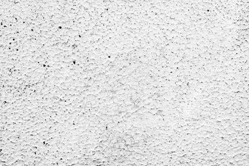 Texture of a concrete wall with cracks and scratches which can be used as a background