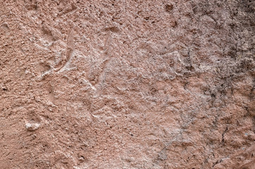 rough stone wall in brown color