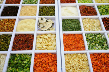 Set of fragrant spices and vegetables top view. Dried vegetables and herbs.