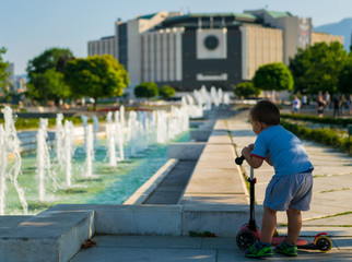 little boy and fountains