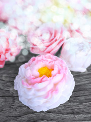 Close up spa  peonies flower background.  Soap aromatherapy treatment. Valentines day,  Mothers day,  perfume or cosmetic products concept. Copyspace. Bokeh effect.