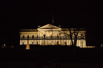 Washington DC - December 5, 2015:  A view of the front of the White House at night - 313863342