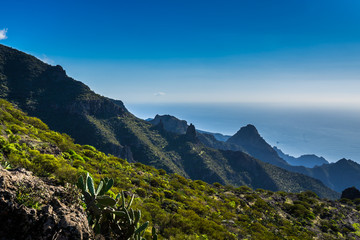 Spain, Tenerife, Endless view above blue ocean horizon from cliffy mountains of masca canyon on sunny day