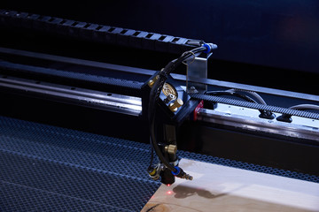A fragment of a high-precision laser milling machine for processing wood, plastic and light...