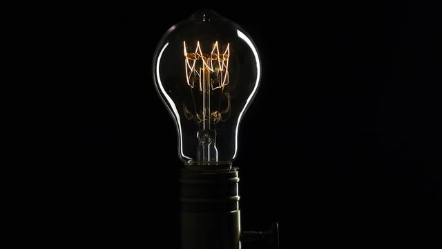 Light bulb Turns On and Off. Close Up.