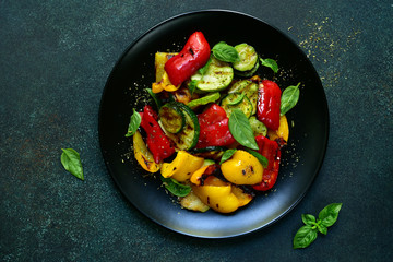 Grelled vegetables with fresh basil. Top view with copy space.