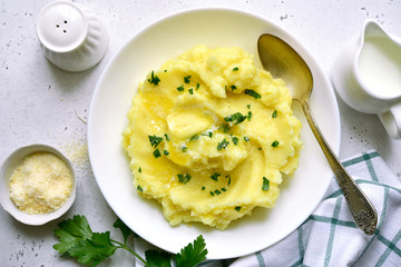 Mashed potato with cheese and herb. Top view with copy space.