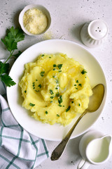 Mashed potato with cheese and herb. Top view with copy space.