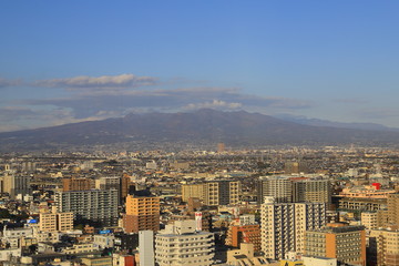 Fototapeta premium Aerial view of Takasaki city and Mount Akagi, Gunma, Japan