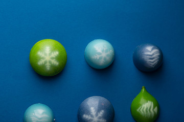 Handmade chocolate on blue background
