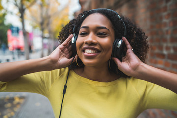 Afro american woman listening music
