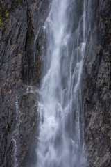 Fototapeta na wymiar Thunder Creek Falls. Haast Makarora Pass Highway. South Island New Zealand. River and rocks