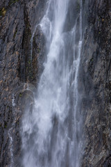 Thunder Creek Falls. Haast Makarora Pass Highway. South Island New Zealand. River and rocks