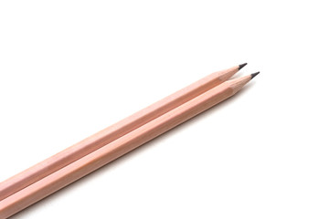 Brown pencils on white background. Creative placement of lots of pencils together in a group.