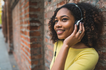 Afro american woman listening music