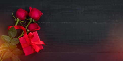 Valentine's Day background.. Roses and red gift box