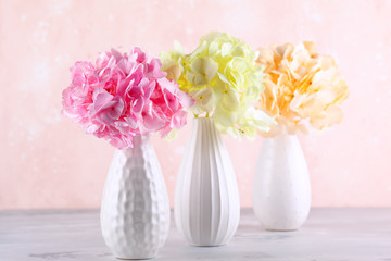 Bouquets of beautiful hydrangea in vases