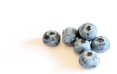 Fresh blueberries on the white background.